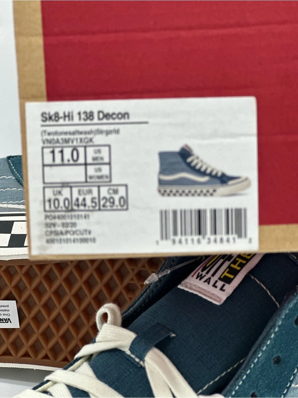 Vans Mid-Top Sneakers in Teal and White with Checkerboard Sole